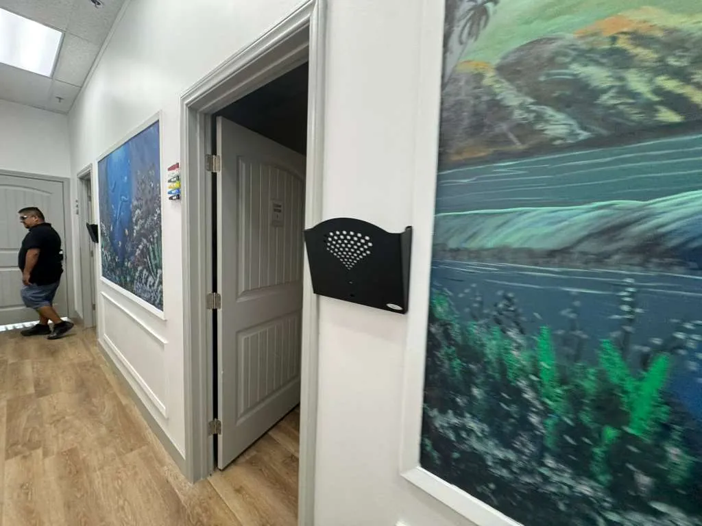 Decorated hallway with paintings San Ysidro clinic